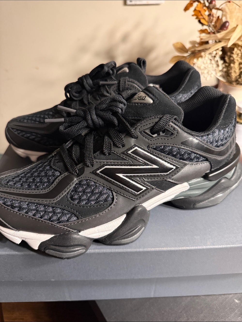 New Balance Men’s Black Athletic Sneakers with Silver Accents
